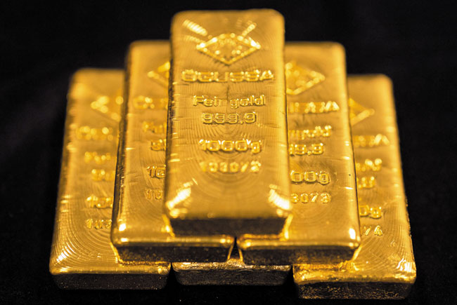 1㎏짜리 골드바가 쌓여 있어요. /AFP 연합뉴스